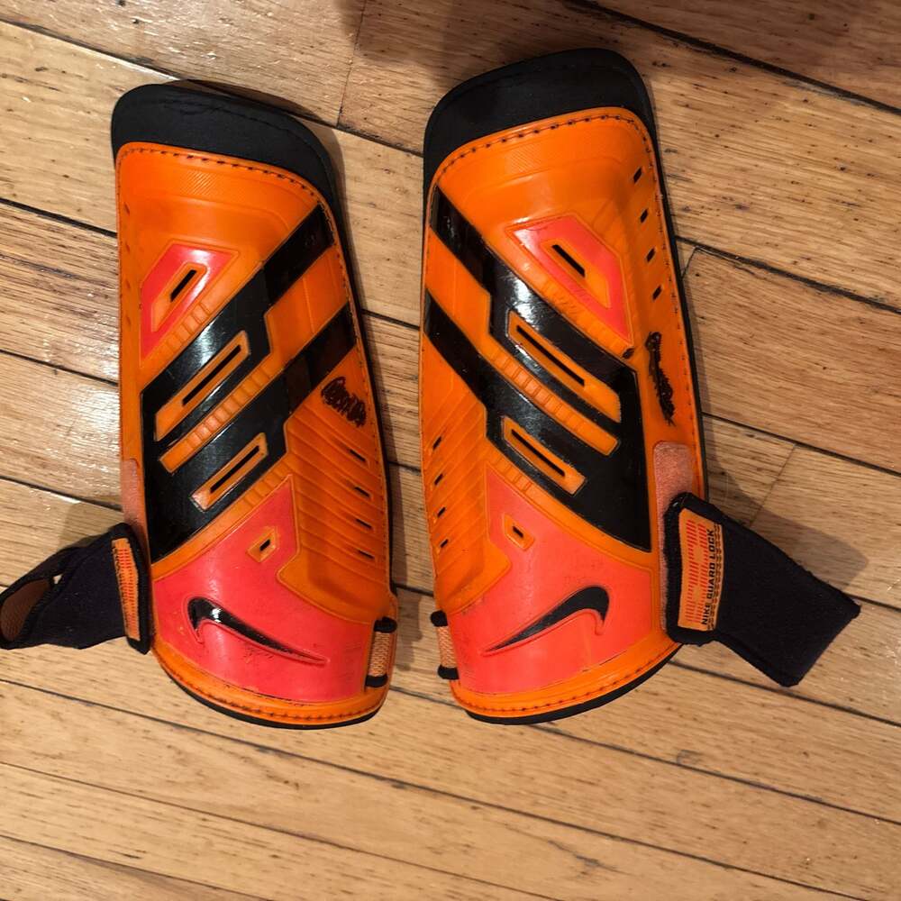 Nike Protegga Shield Orange and Black Soccer Shin Guards with Guard Lock Straps